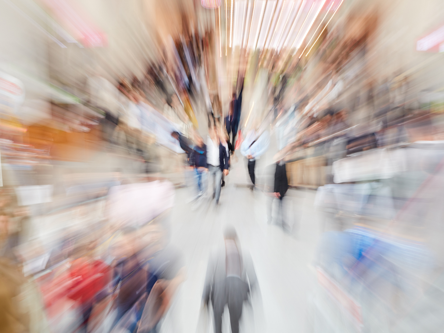 Blurry fast paced image of a chaotic shopping experience without a UX Design element.